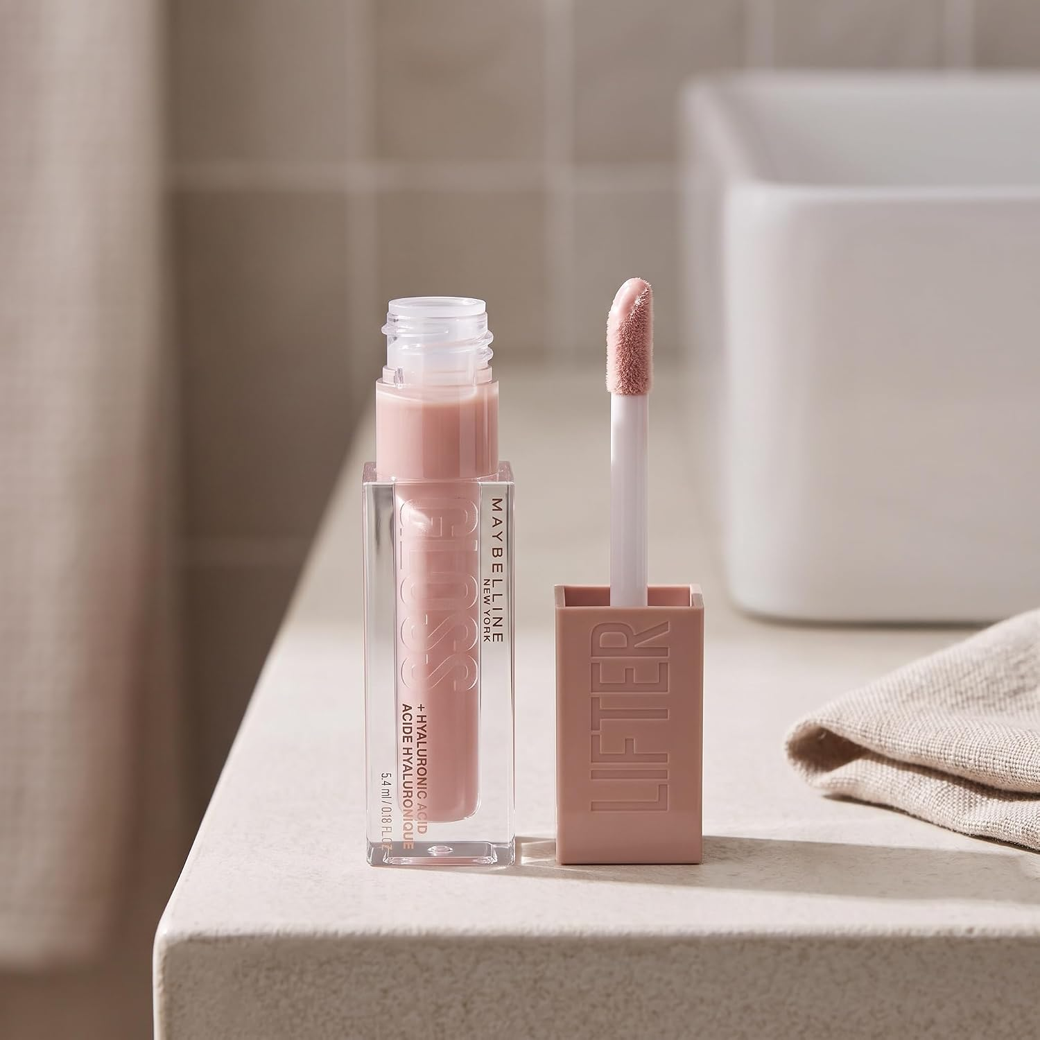 Maybelline Lifter Gloss, Hydrating Lip Gloss with Hyaluronic Acid, Ice, Pink Neutral, 0.18 Ounce Maybelline Lifter Gloss, Hydrating Lip Gloss with Hyaluronic Acid, Ice, Pink Neutral, 0.18 Ounce